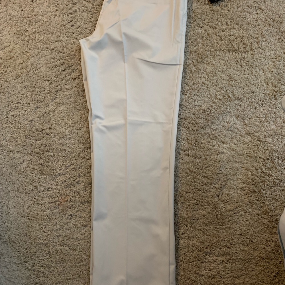 Brand new adidas golf pants.